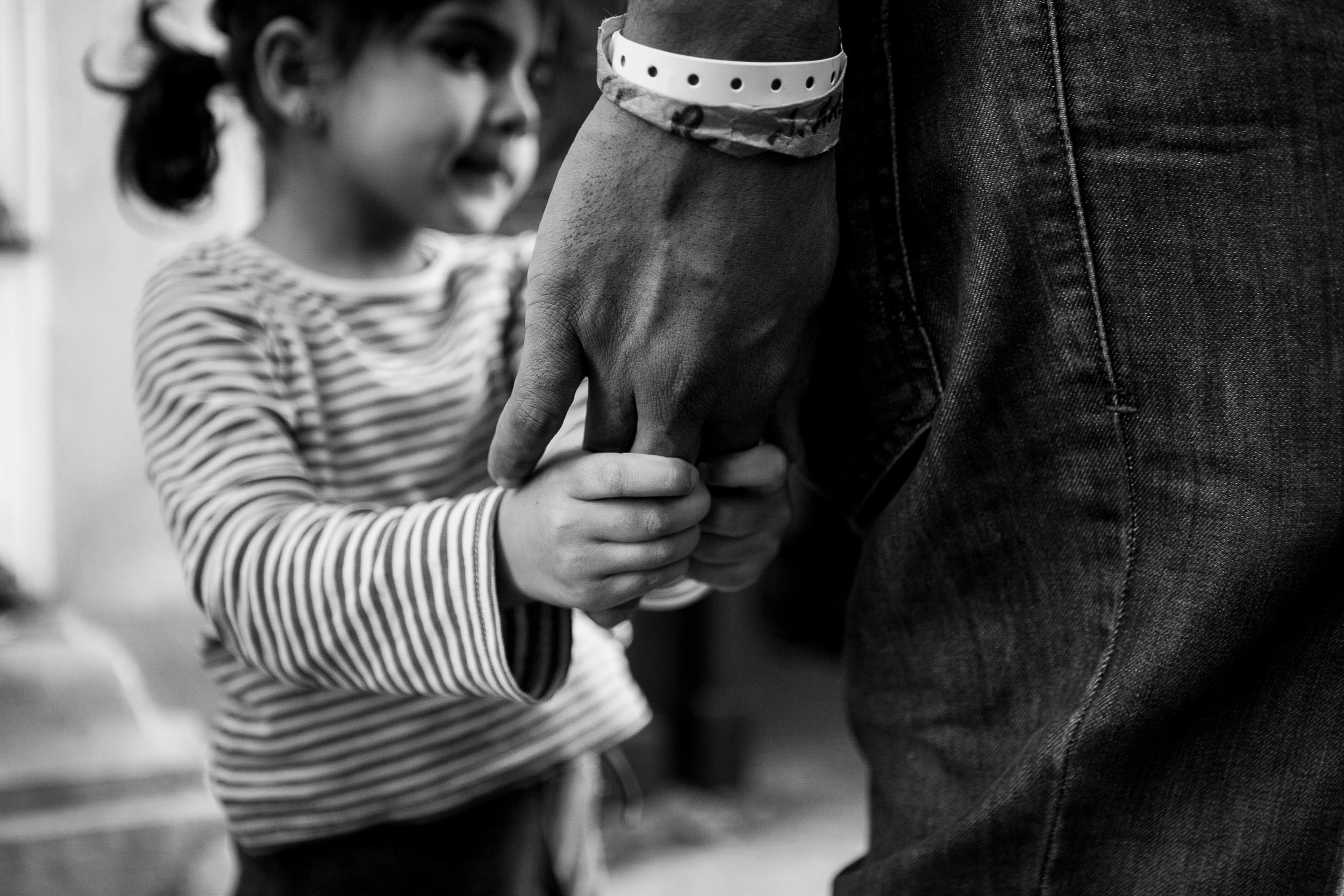 Young girl and father, from Displaced: Stories from the Syrian Diaspora.