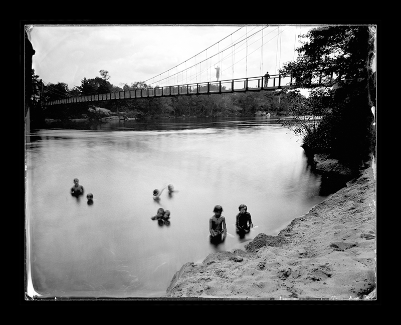 Cover of Take Me to the River: Photographs of Atlantic Rivers. Swimmers, Swinging Bridge, Topsham, Maine, Androscoggin River, 2014. Cover of Take Me to the River: Photographs of Atlantic Rivers. Swimmers, Swinging Bridge, Topsham, Maine, Androscoggin River, 2014.
