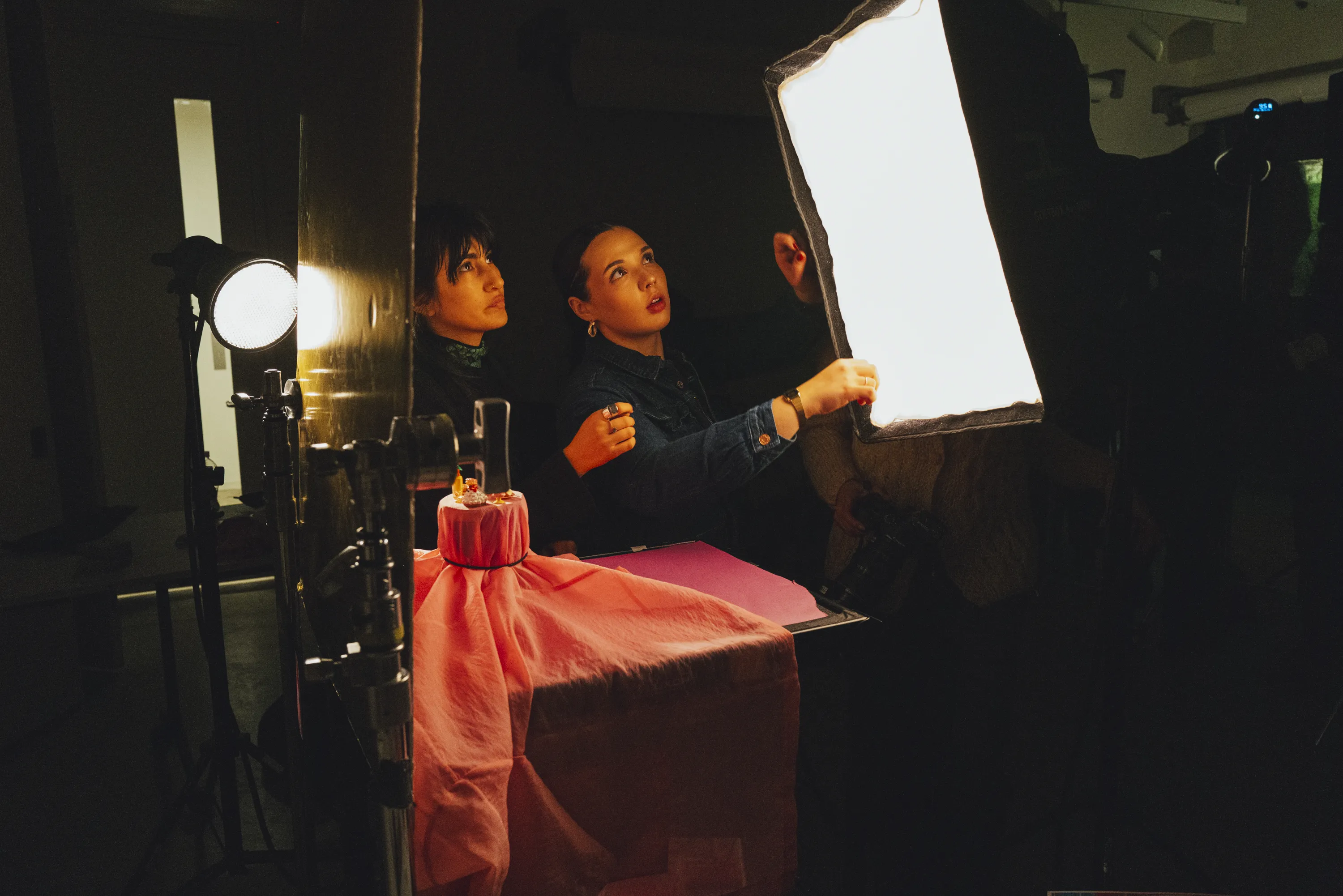 Students working in a lighting studio