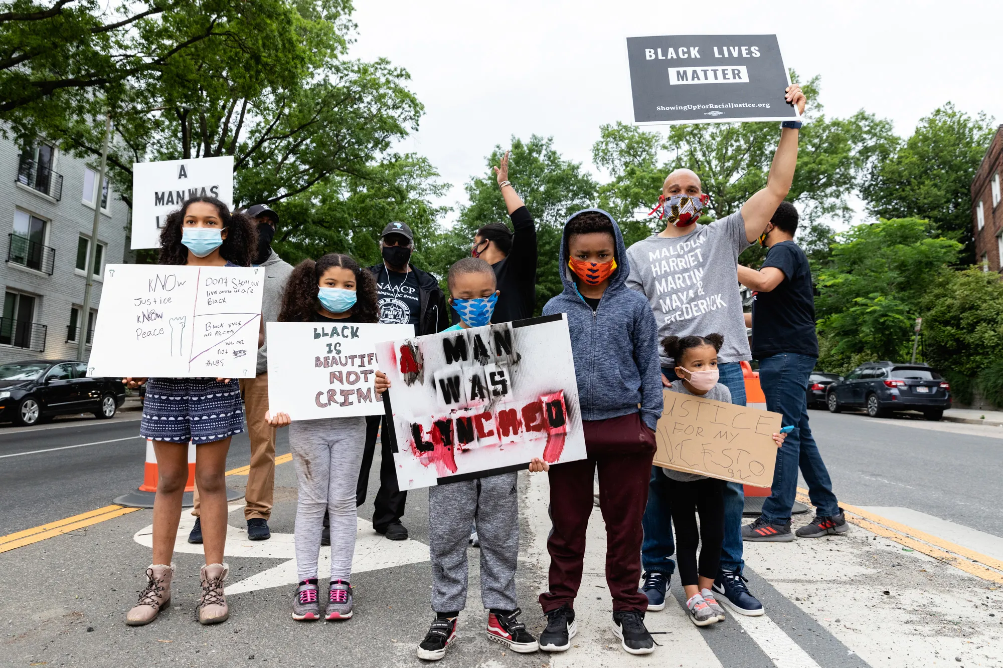 A group of kids protesting.