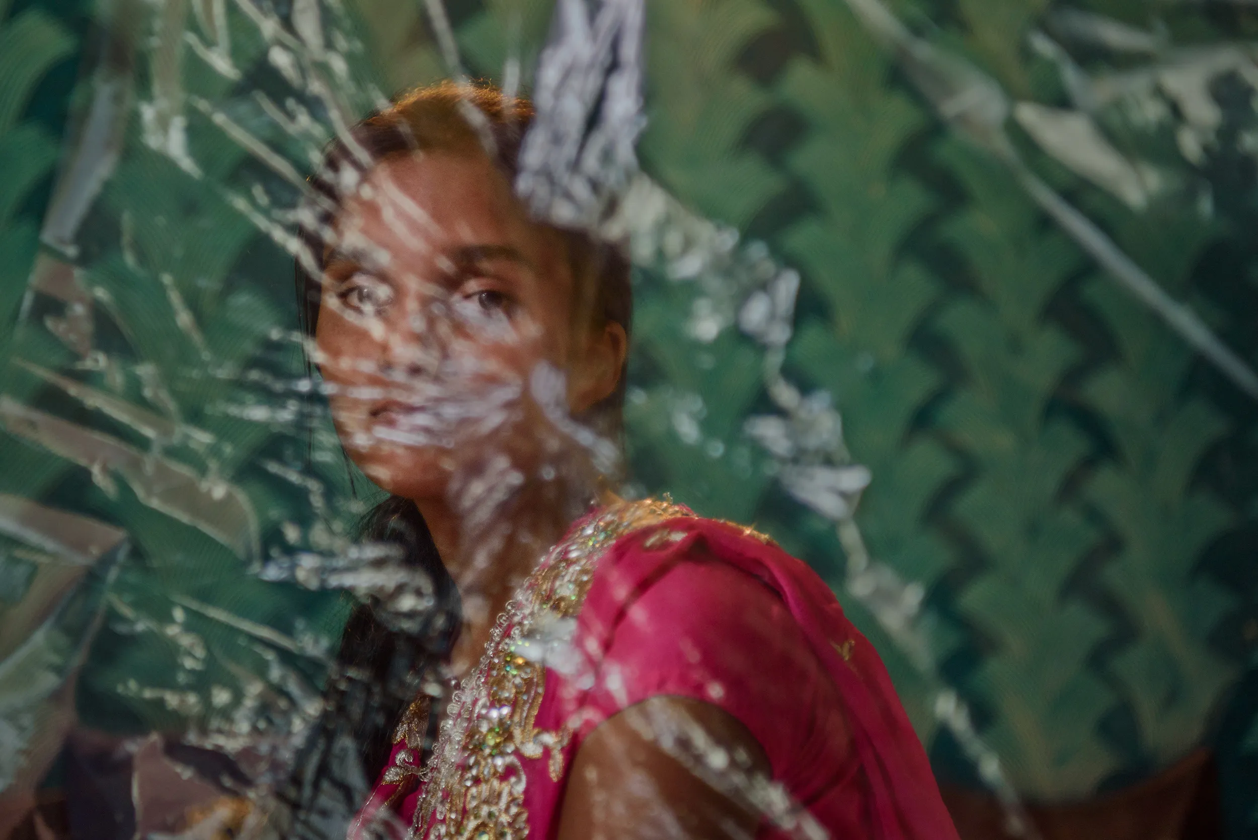 Broken picture of a woman.