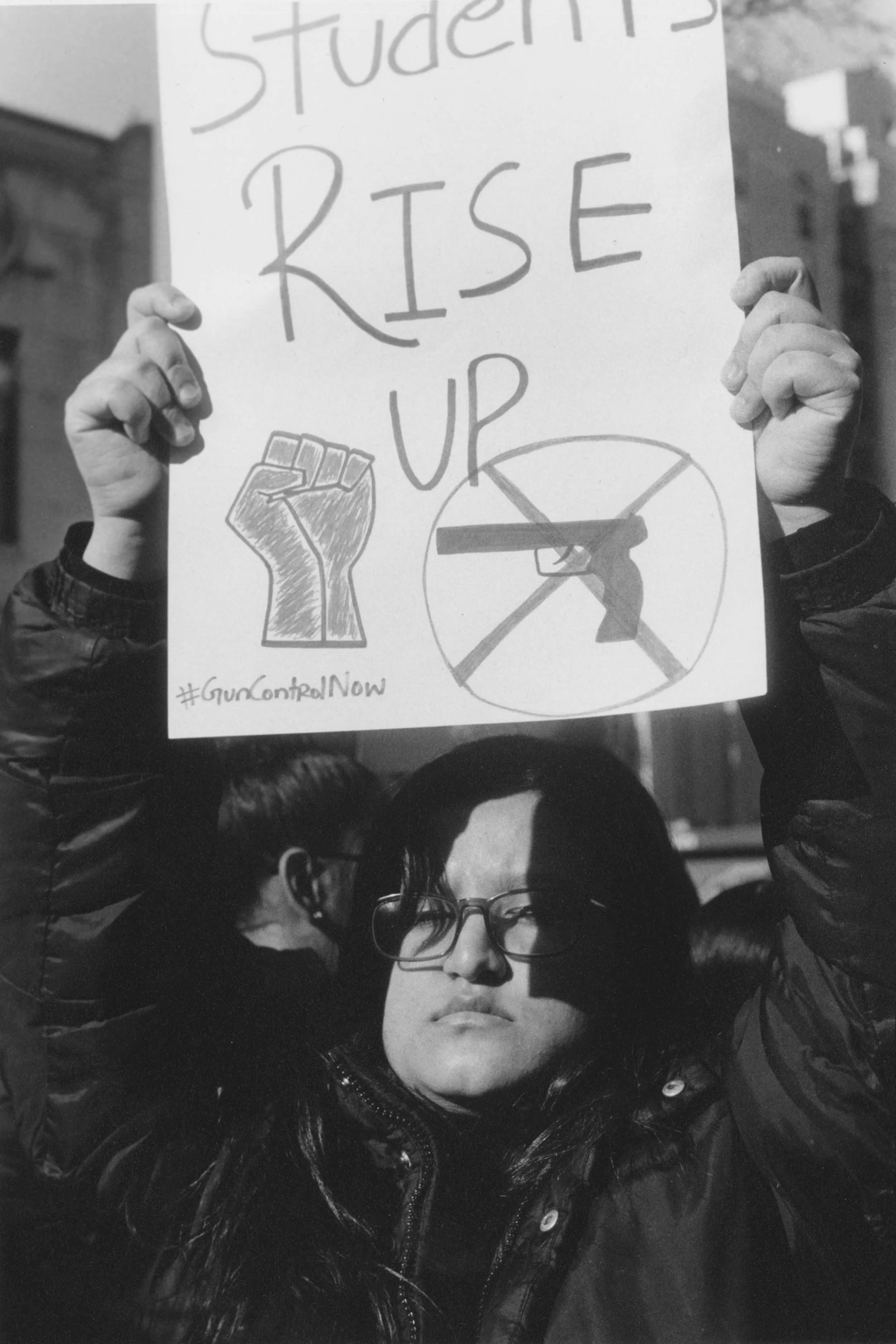 A protester with a sign about students against gun violence. 
