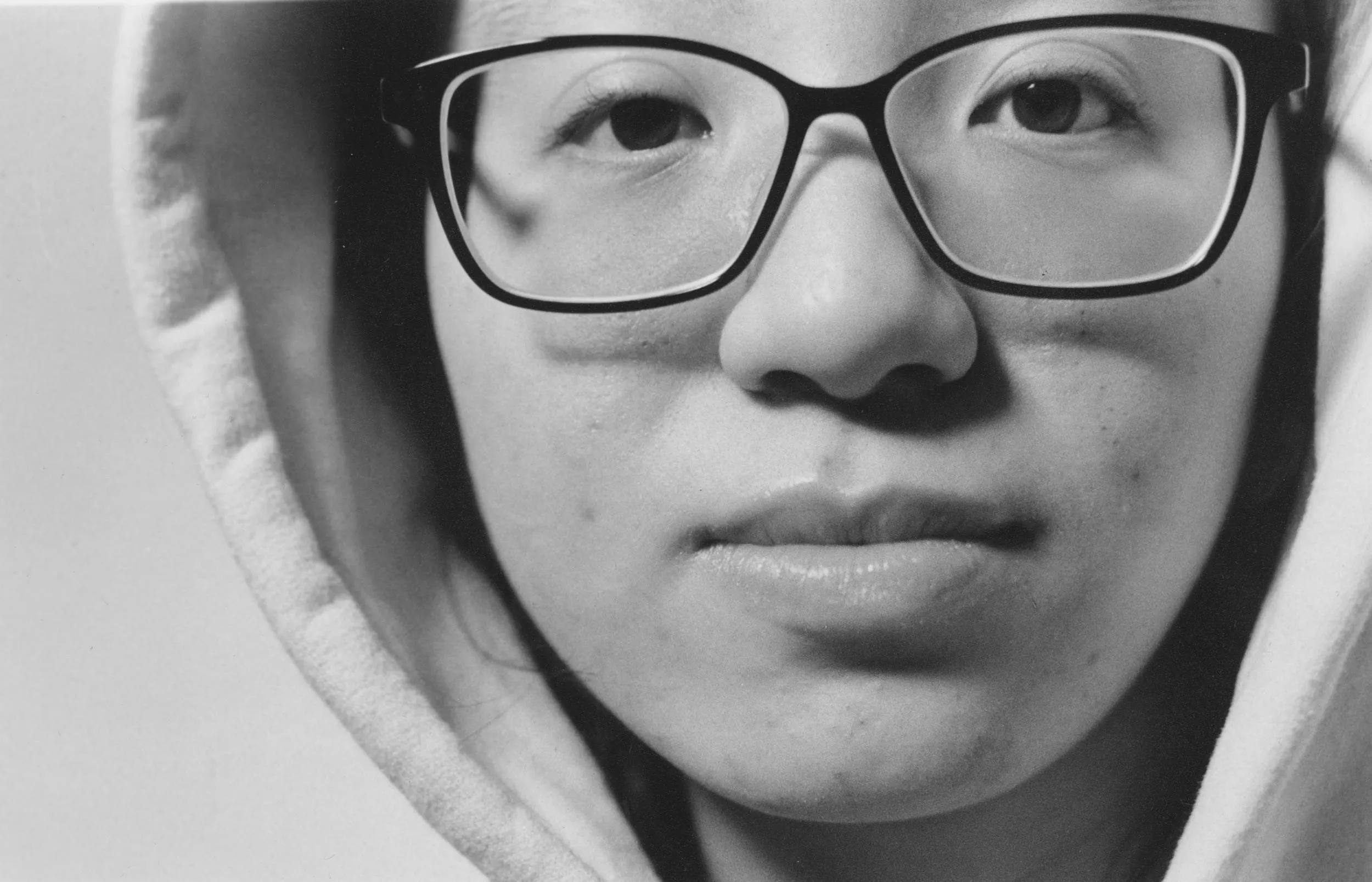 Black and white image of the face of a girl