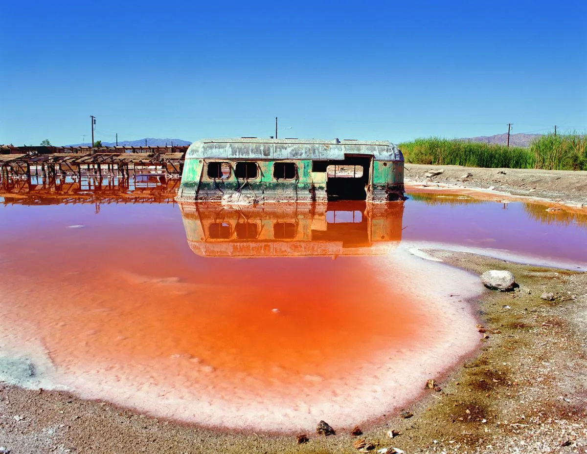 A picture of a bus in water.