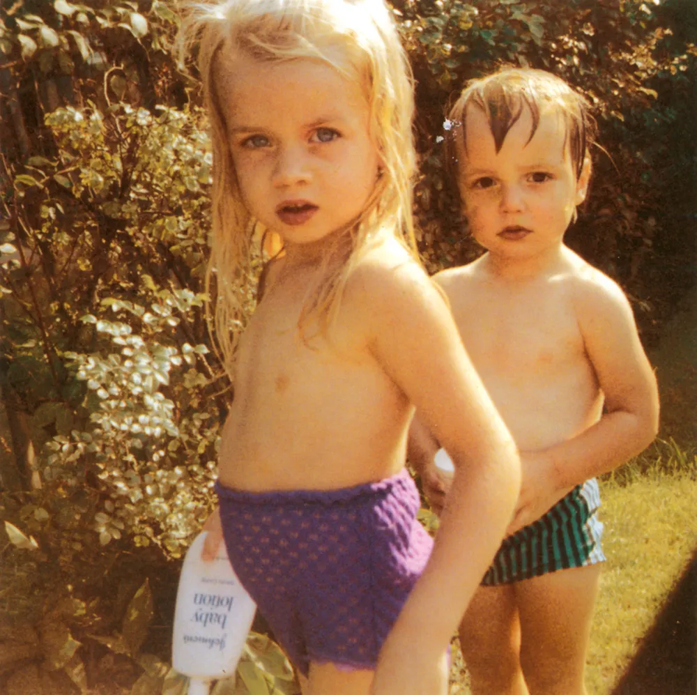 Two kids playing outside.