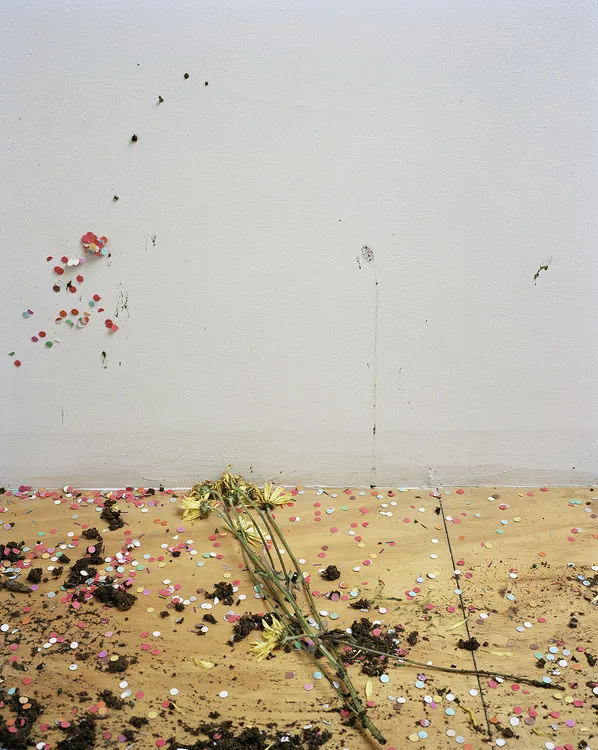 An abstract painting with flowers.