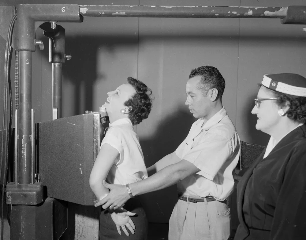 A lady getting arrested.