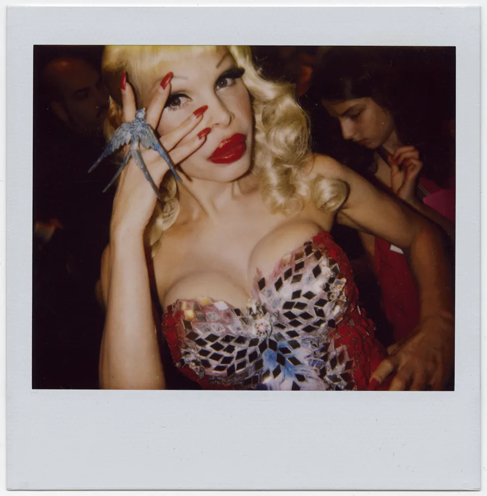 Blonde women having fun at a party.