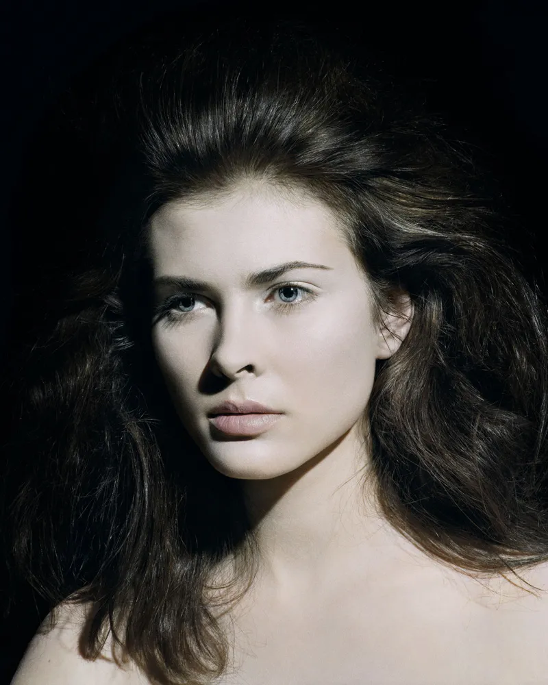 A women looking towards the left.