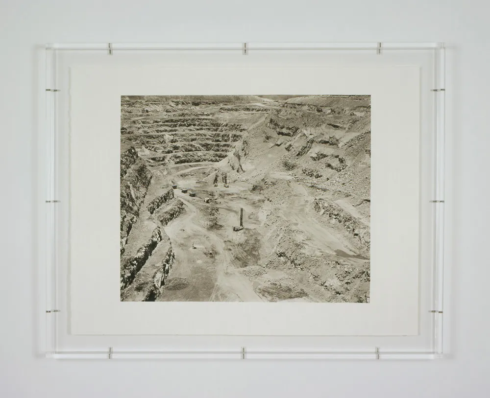 A framed image of an empty quarry.