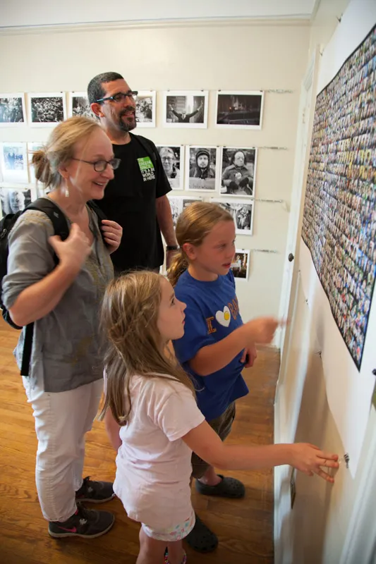 A family looking at photos.