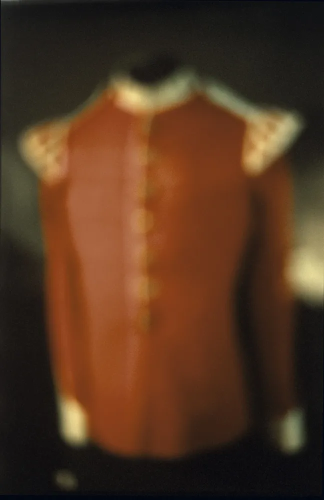 An out of focus soldier's top. 