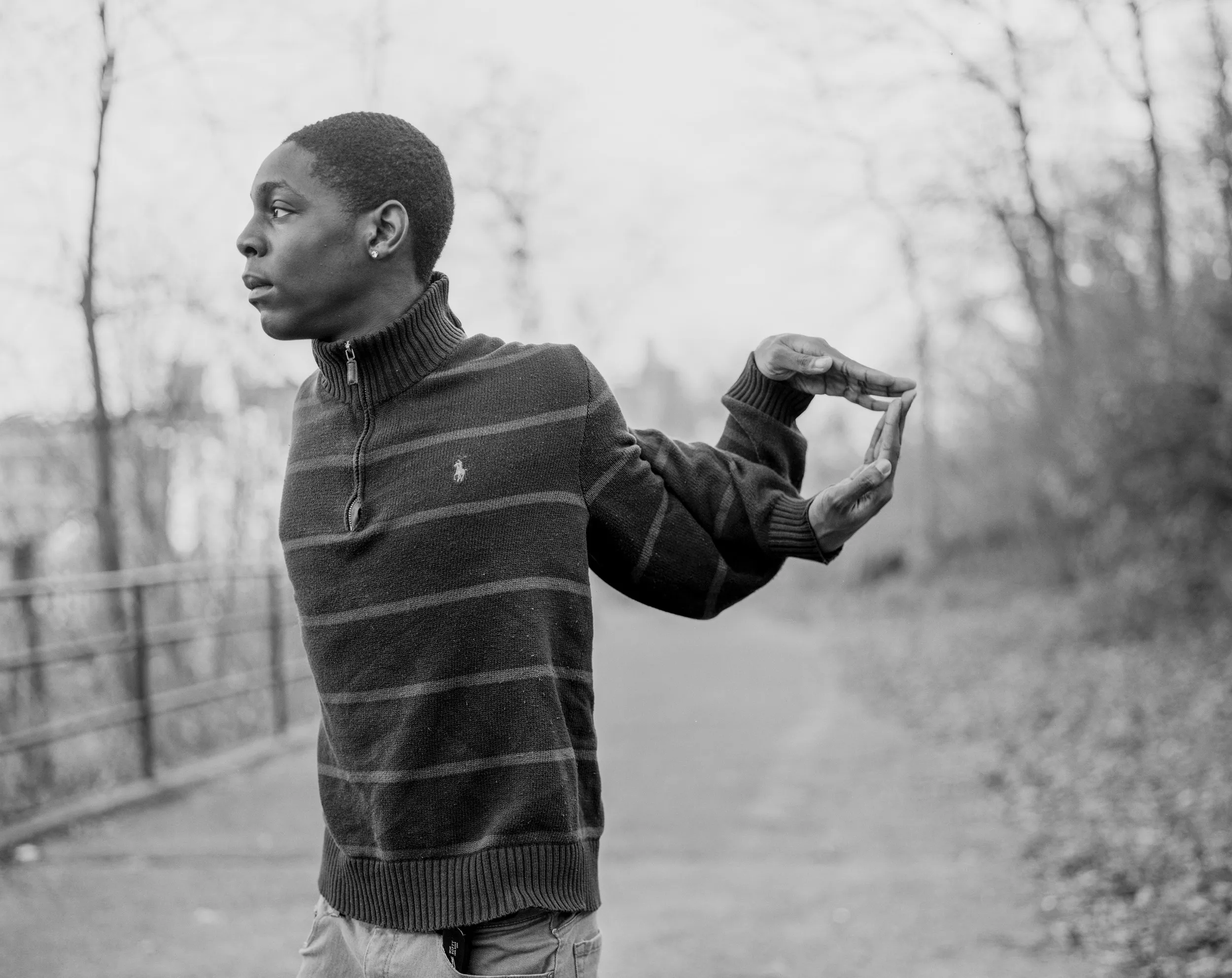 Man twisting his arms behind his back