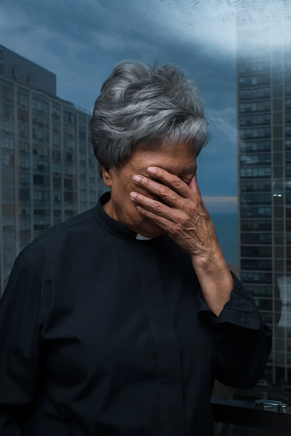 Old lady with her hands on her hand