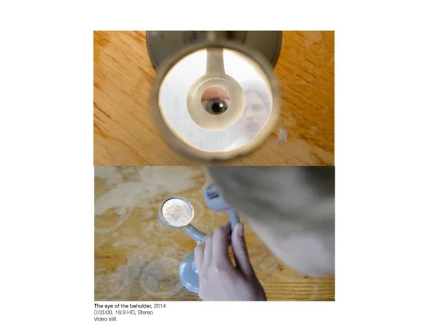 Female using a microscope