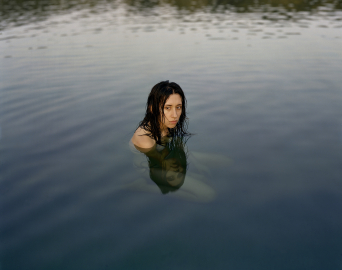 Someone swimming in water. 