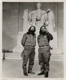 Two man standing in front of the Lincoln memorial.