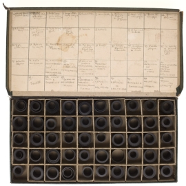 A large camera roll storage container and organizer.