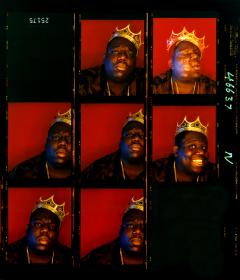 Frames of the Notorious BIG wearing a crown. 
