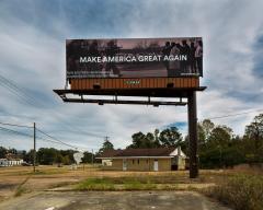 A billboard that says, "Make America Great Again". 