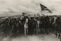 A group of soldier on horses.