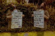 A woman protesting against racism.