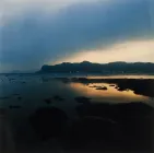 A cove in the early morning right before dawn breaks. 