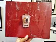 A picture of a door peep hole.