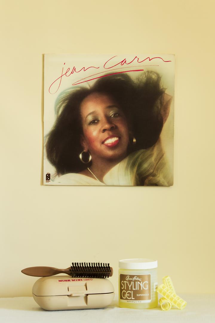 A signed photograph and styling tools.