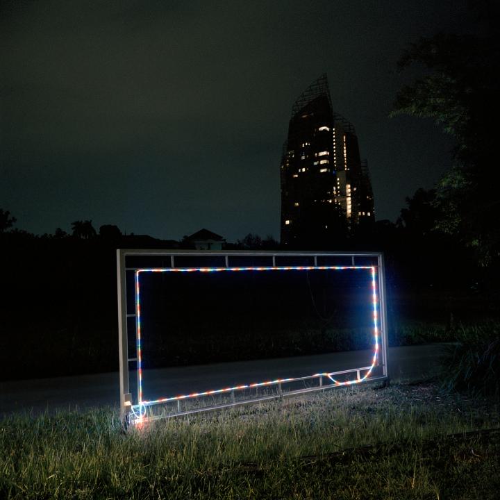 A metal frame with LED lights outside.