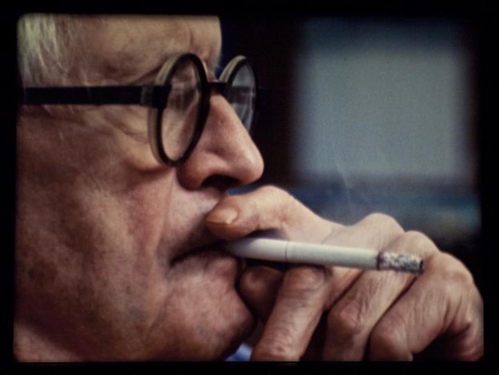 David Hockney smoking a cigarette. 