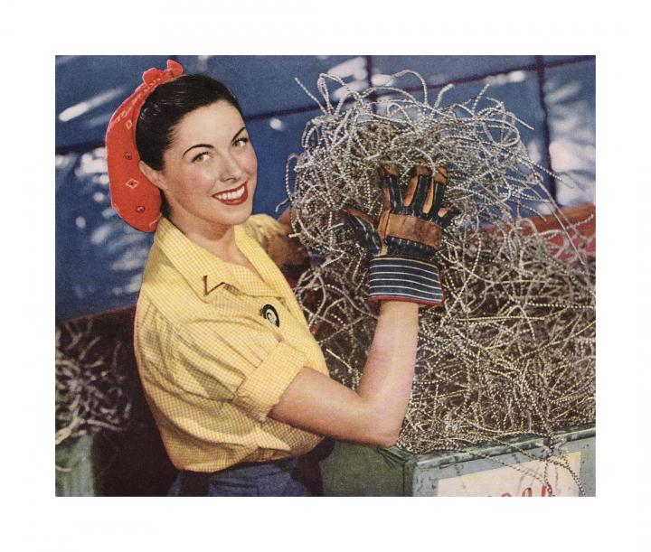 vintage women holding metal wires with gloves on