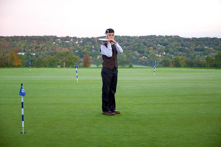 A guy in a golf field