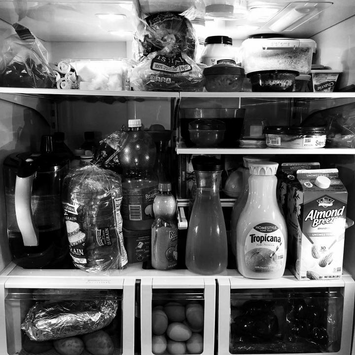 The inside of a packed refrigerator.
