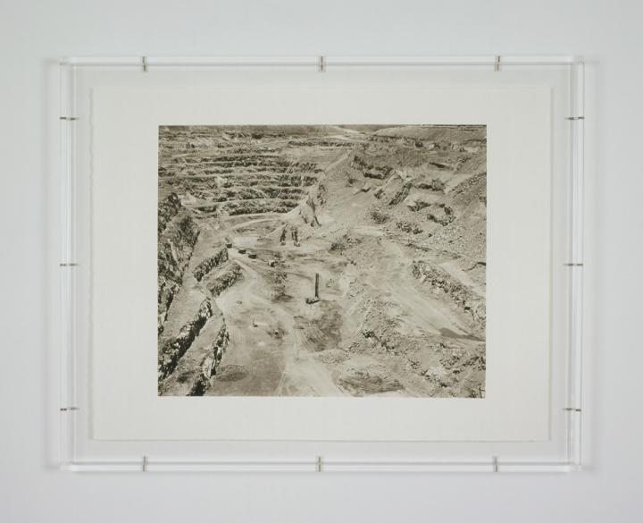 A framed image of an empty quarry.