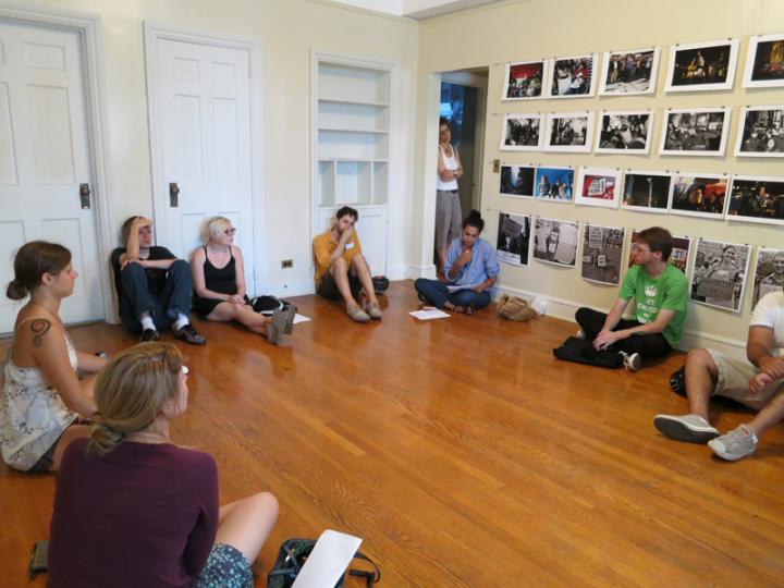 A circle discussion occurring inside a room.