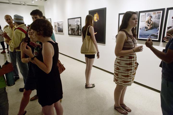 Woman looking at art in an exhibit