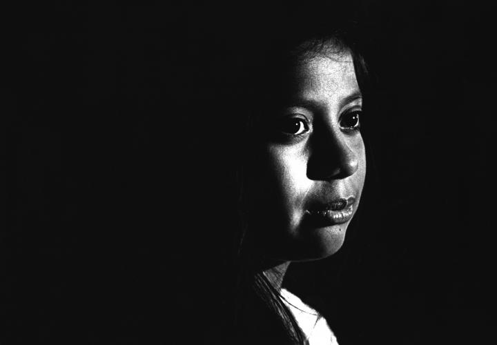 Black and white image of childs face