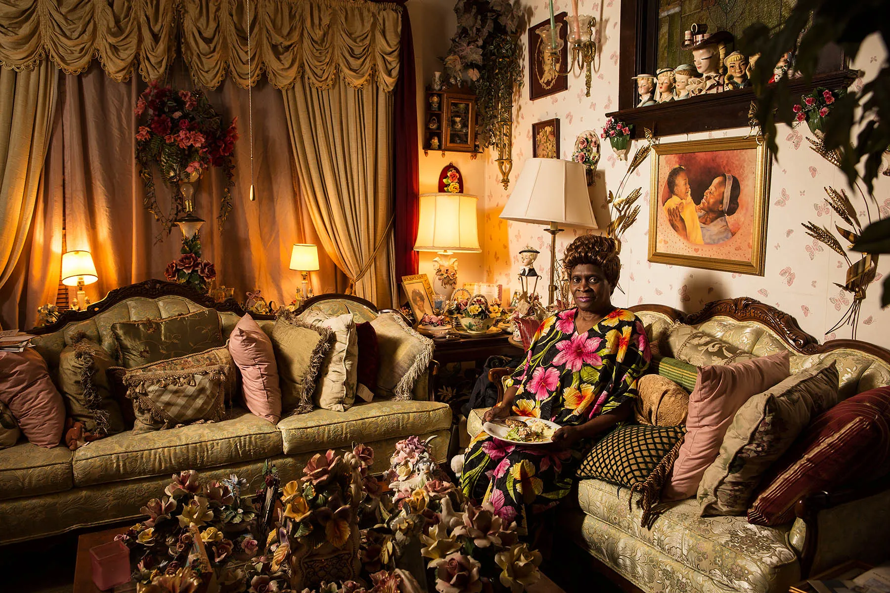 A person sitting down on a couch.