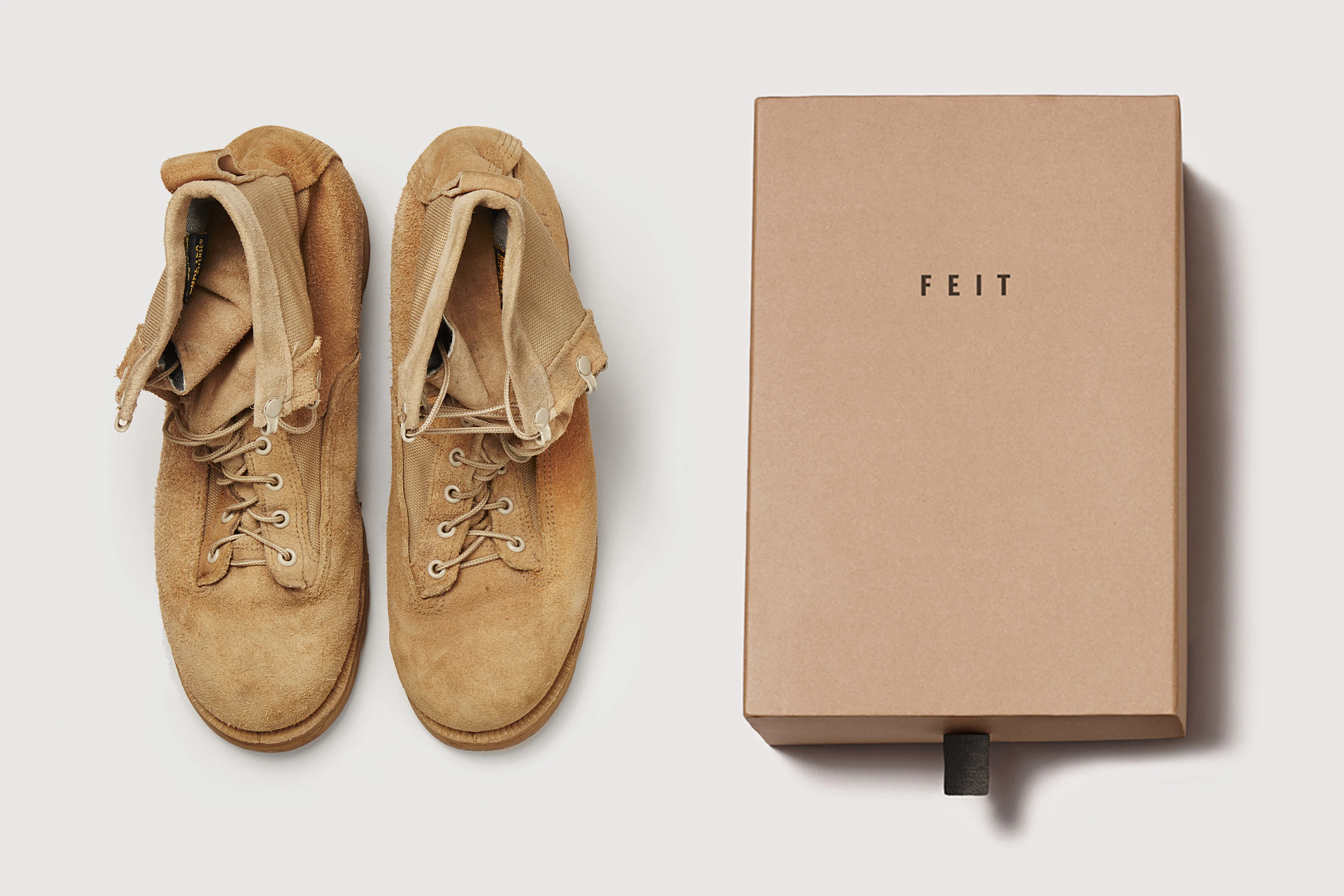 Worn shoes and a box.