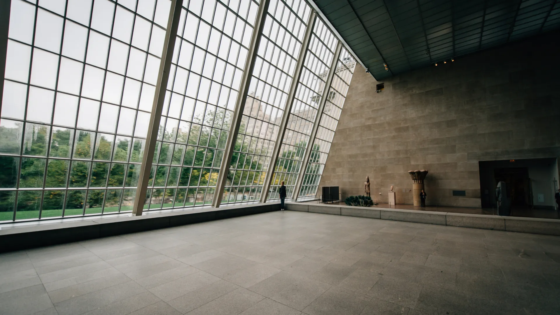 An empty building with large windows.
