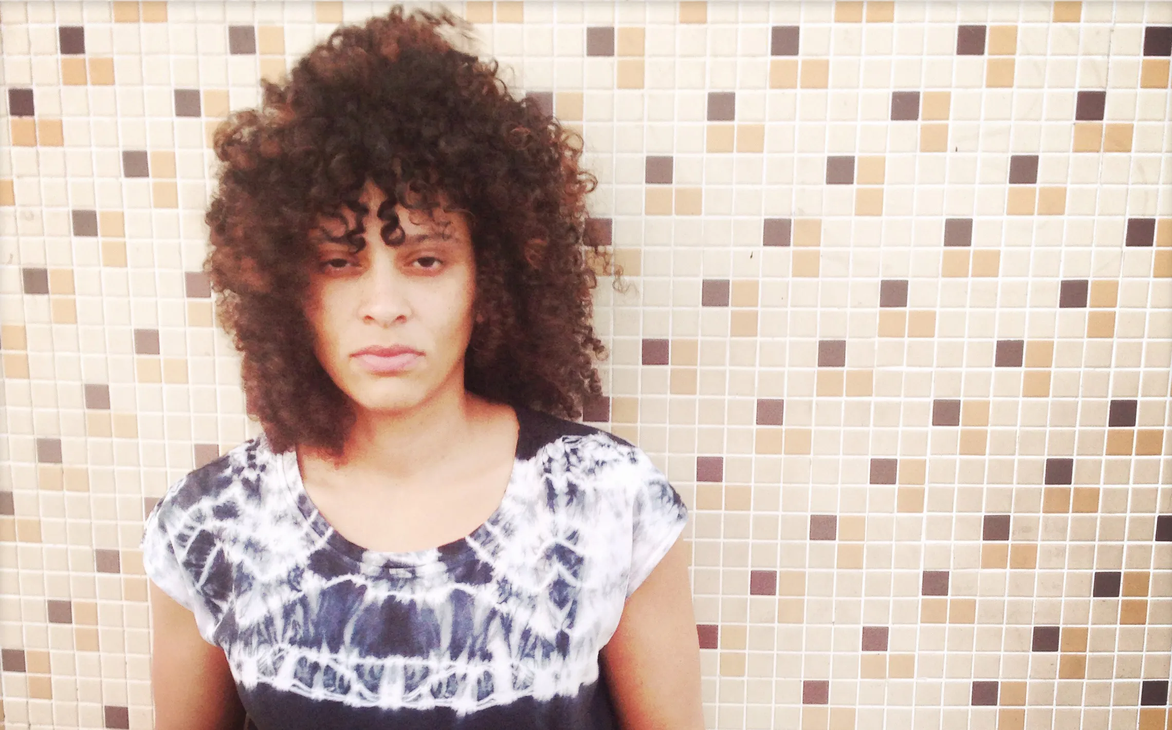 A woman with an indifferent look.