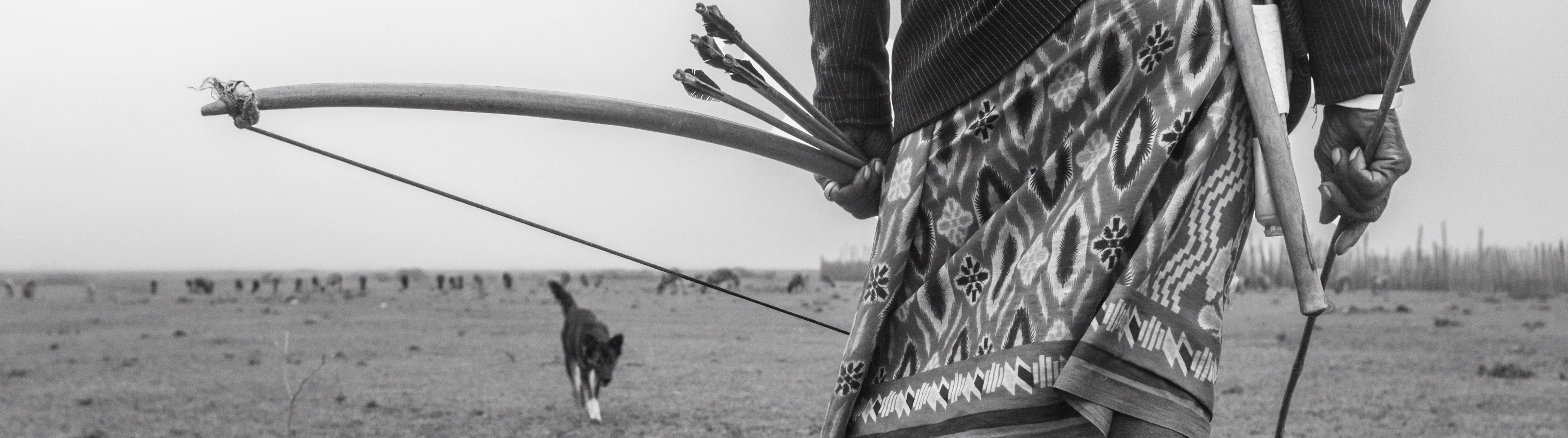 A person holding a bow and arrow.