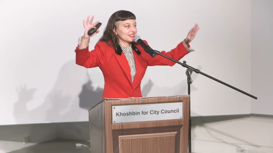 A person standing in front of a podium.
