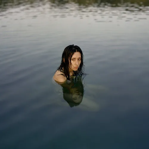A person swimming in water.