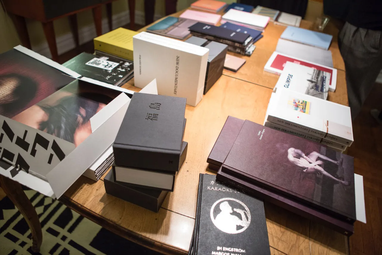 A stack of books on a table.