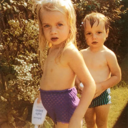 Two kids playing outside.
