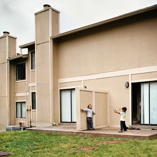 Two kids playing outside.