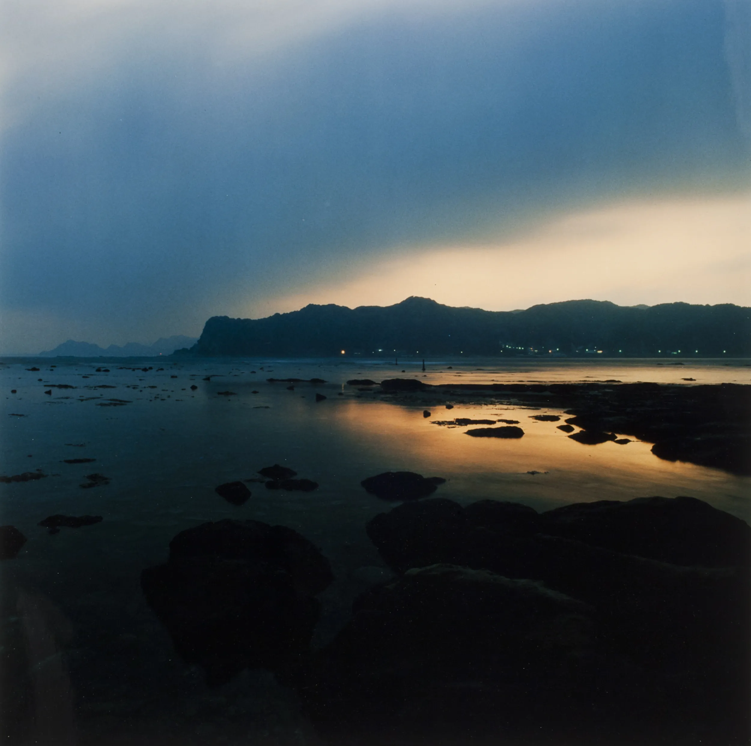 A cove in the early morning right before dawn breaks. 